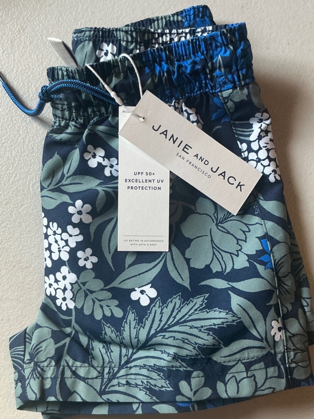 Janie and Jack Navy Floral Swim Shorts with Sage Green Print